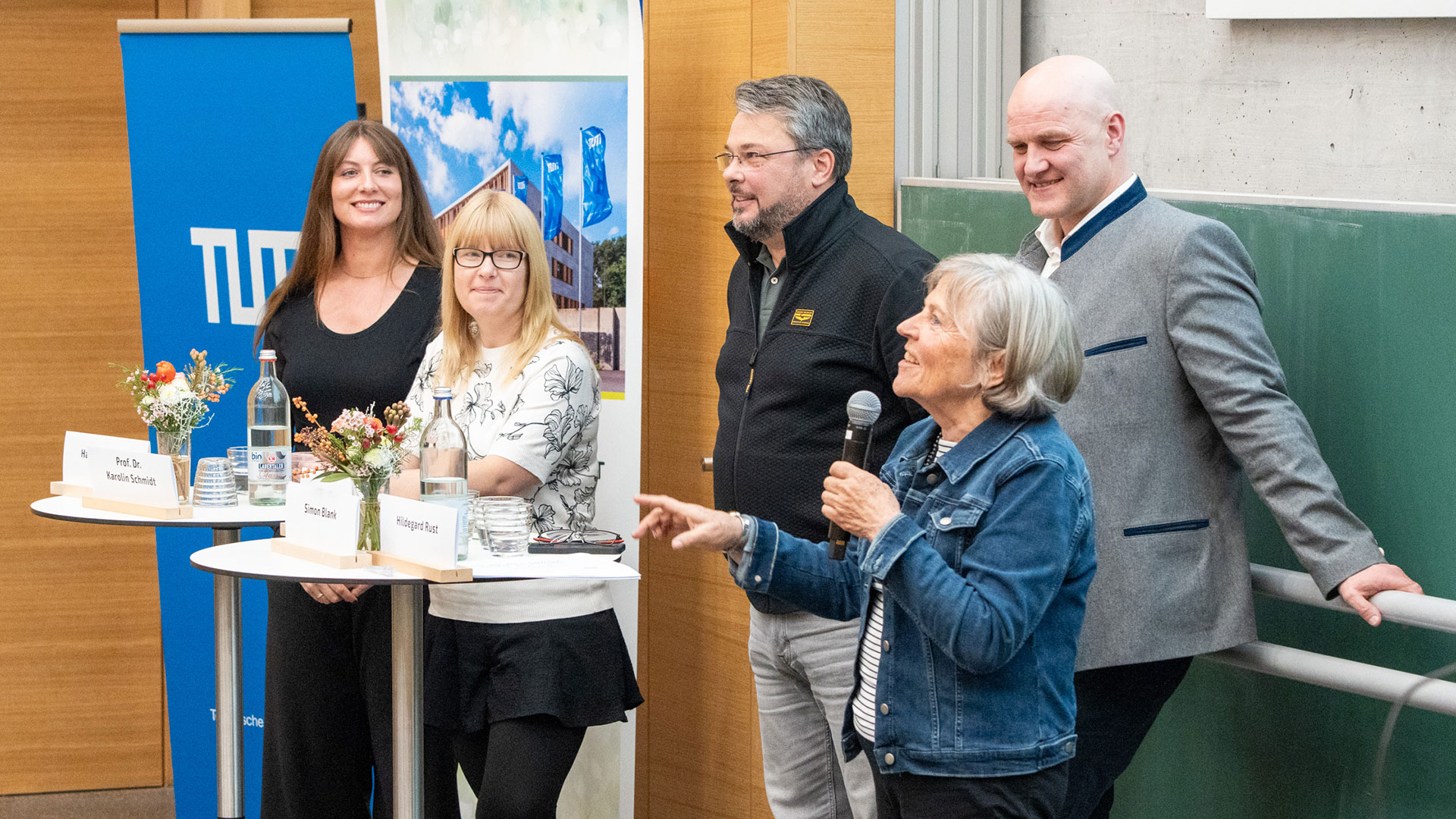 The three women and two men of the podium discussion