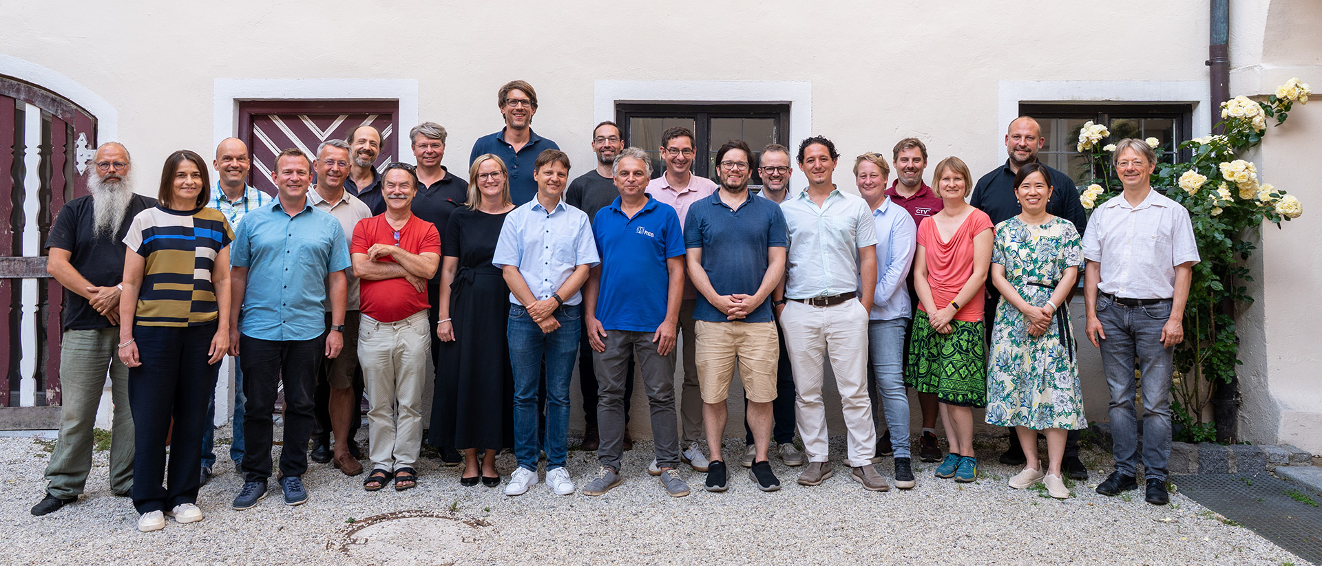 A group shot of 23 professors affiliated with TUMCS