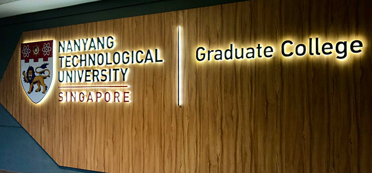 Two TUMCS doctoral students in Singapore