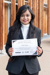 PostDoc Pallabi Bhuyan presenting her Certificate.